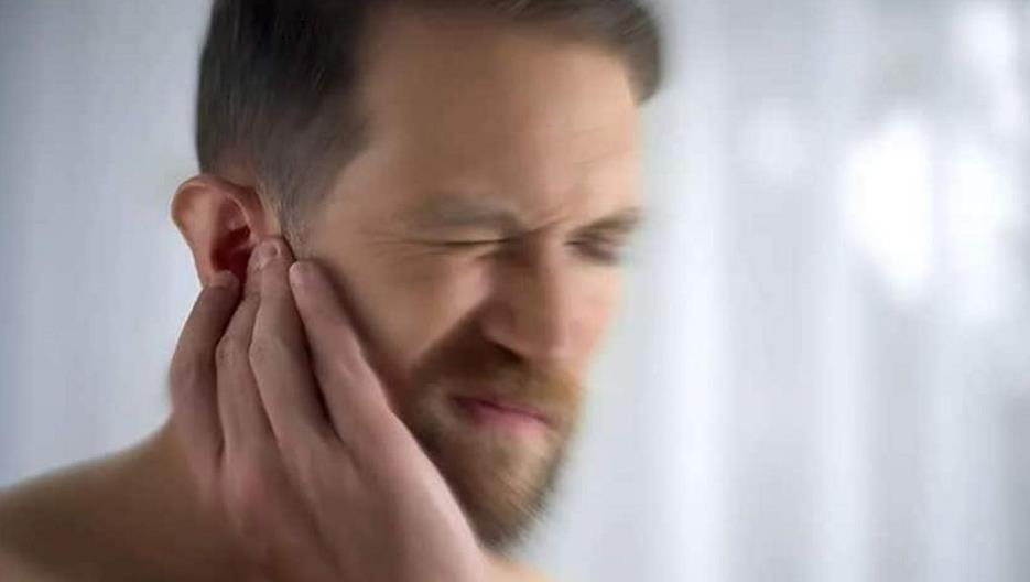 causes of tmj ear fullness