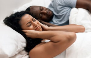 how to deal with a snoring partner